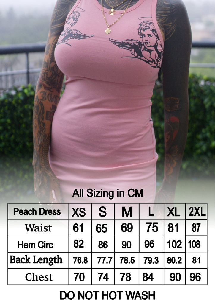 Alternative womens Peach summer dress with tattoo designs. Emo at heart